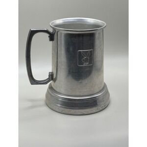 Playboy Club beer mug 1970s. It is made of aluminum and clear glass bottom‎
